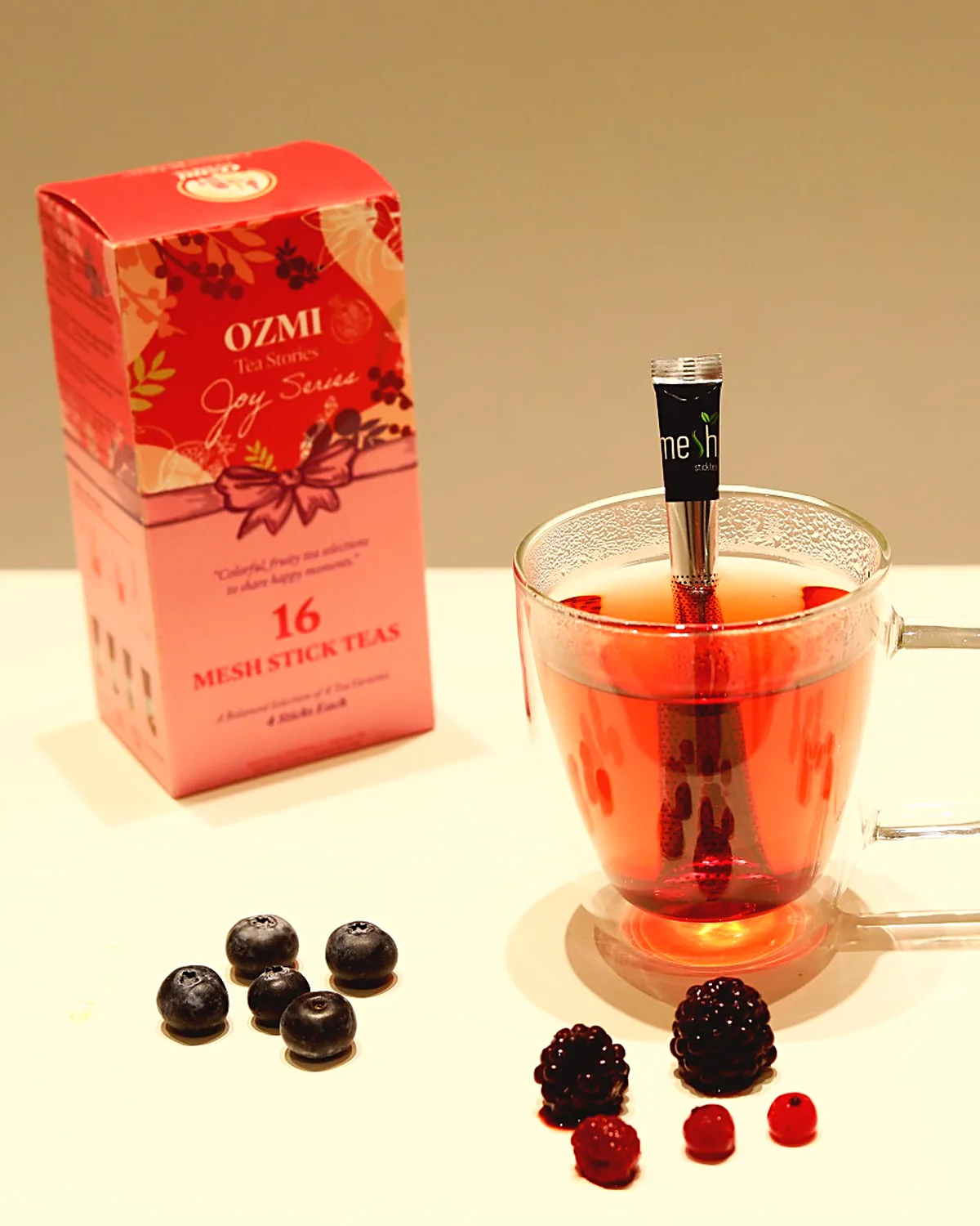 Joy Series fruit tea with the pink OZMI Tea Stories box